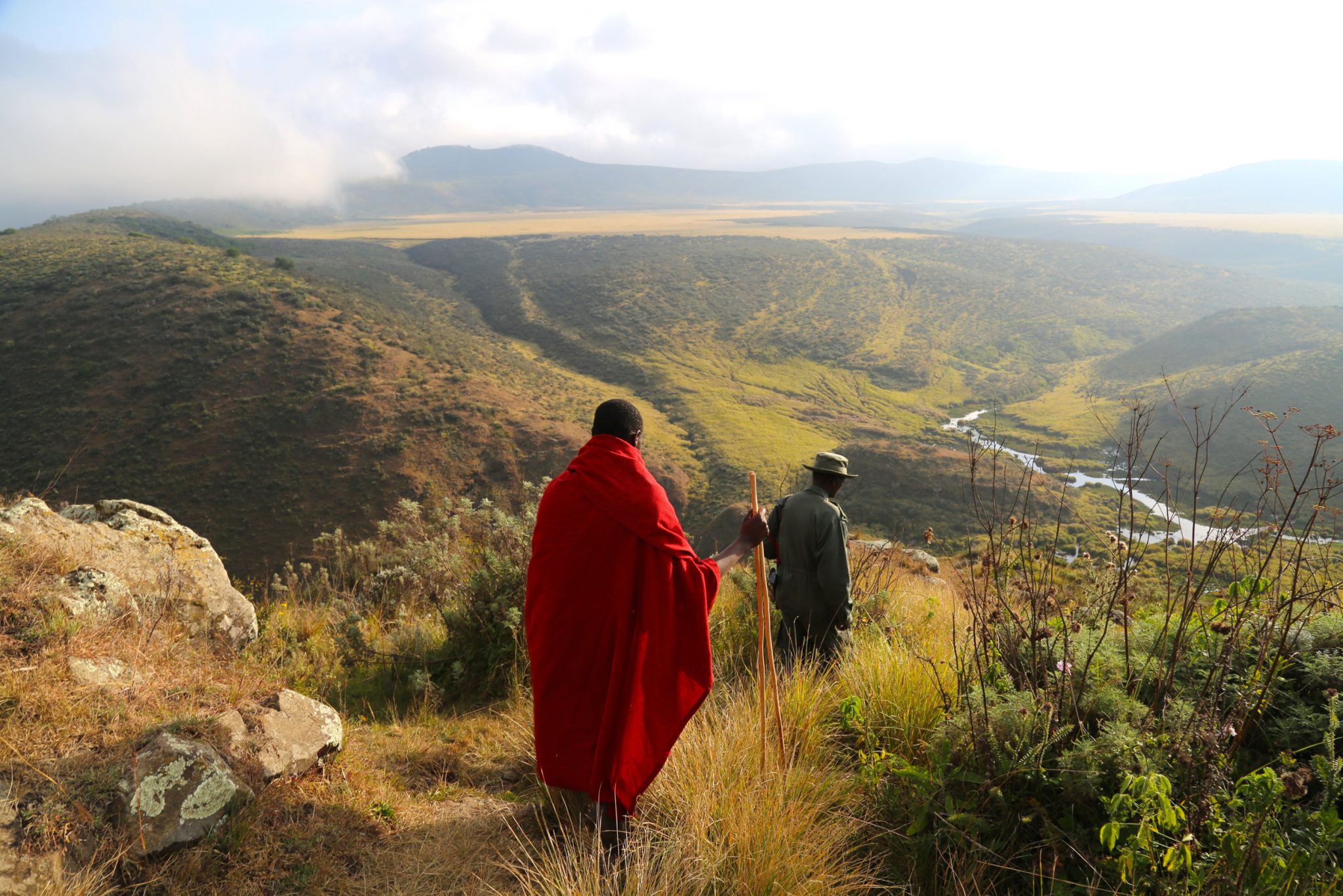 Maasai warrior and armed ranger, Olmoti volcano, Tanzania